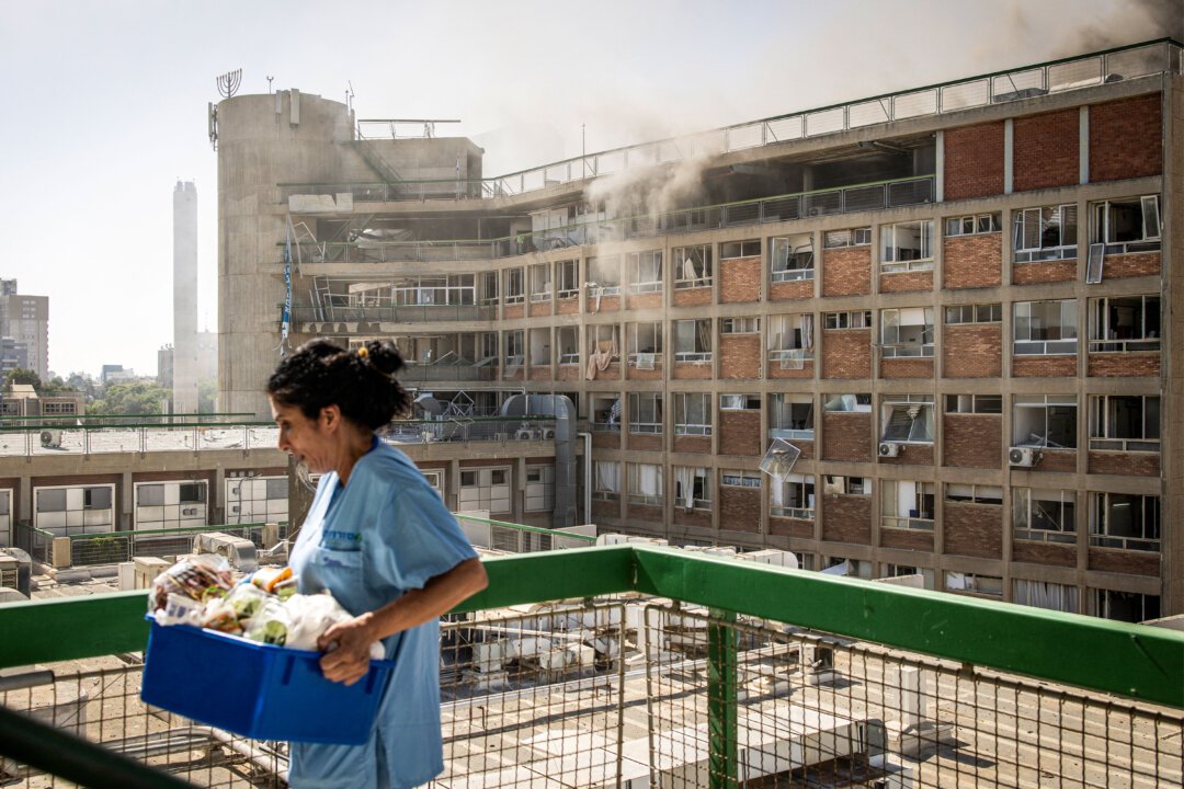 Global Impact: Hurricane Erick, Israeli Hospital Attack, and Europe’s Heatwave in Pictures